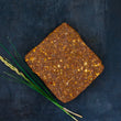 Load image into Gallery viewer, 100% grass fed and field harvested raw bison chorizo on a black background
