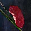 Load image into Gallery viewer, 100% grass-fed and field harvested raw bison strip steak