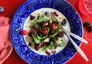 colorful salad on blue rimmed plate