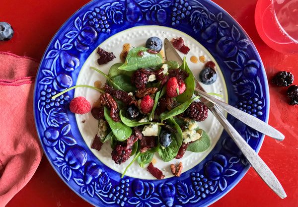 colorful salad on blue rimmed plate