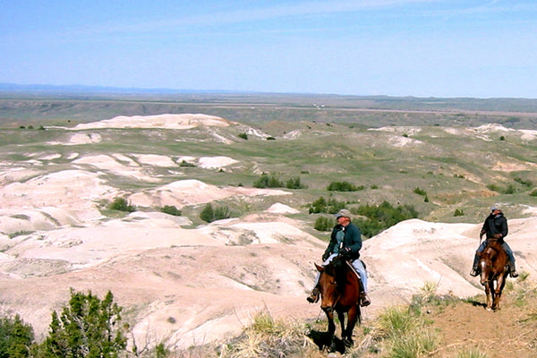 Dan O'Brien on horseback in south dakota