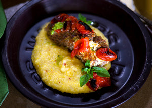 Bison Meatloaf with pesto & tomatoes on polenta