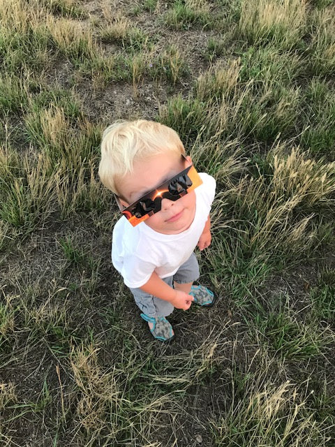 Lincoln wearing eclipse glasses