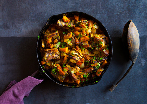 Bison Short Ribs with Carrots & Curry in Skillet