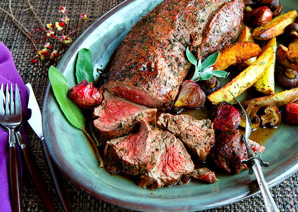 100% Grass-Fed Bison Tenderloin Roast, sliced with Potatoes & onion