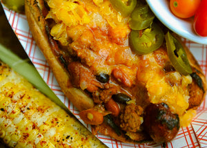 Bison Hot dogs covered in Bison chili