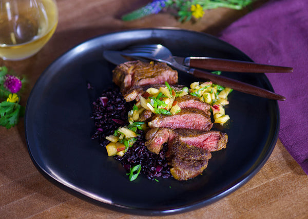 Grilled bison Steak, Sliced with fruit salsa