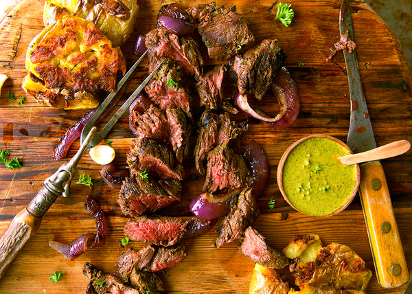 Grilled, sliced, Grass-Fed bison Steak with Chimichurri Sauce
