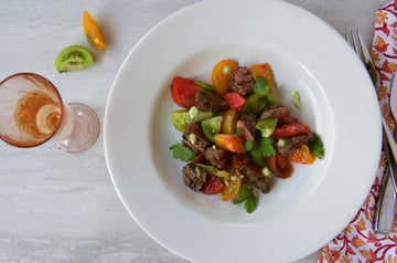 Grilled Tenderloin Steak Tips with Heirloom Tomatoes and Avocado Dressing