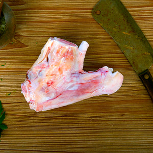 100% grass-fed and field harvested bison hock bone on a wooden table