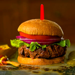 100% grass-fed and field harvested ground buffalo burger with lettuce, tomato, and onion
