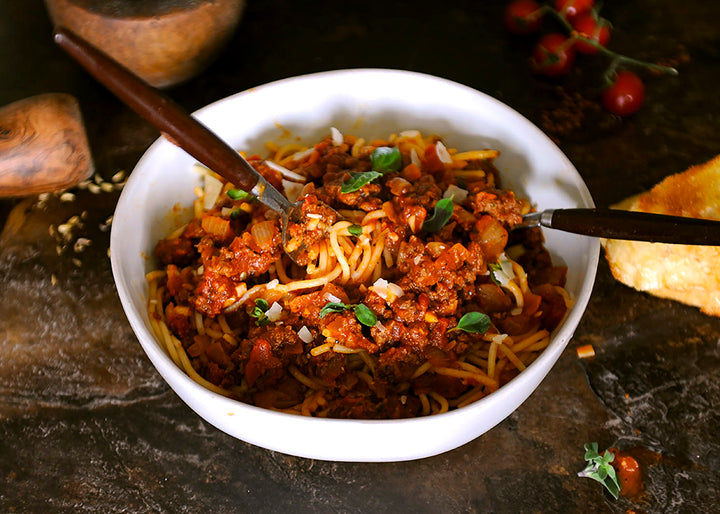 Bround Bison Bolognese in in a white bowl 