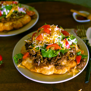 100% grass-fed and field harvested ground buffalo dakota taco on a white plate