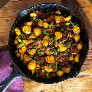 Bison Chorizo Sausage with Potatoes in skillet