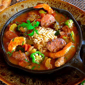 100% grass-fed buffalo andouille sausage in a cast iron skillet full of gumbo