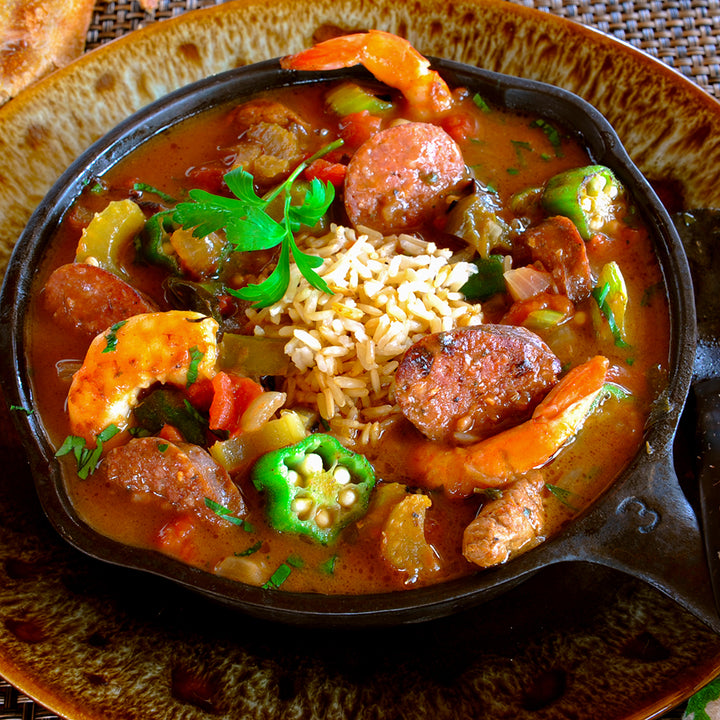 100% grass-fed buffalo andouille sausage in a cast iron skillet full of gumbo