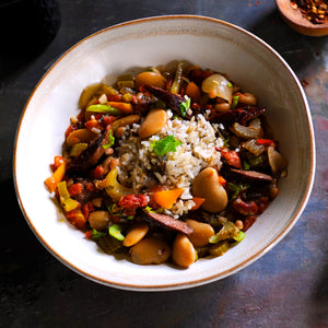 100% grass-fed and field harvested bison andouille sausage in a rice and vegetable bowl