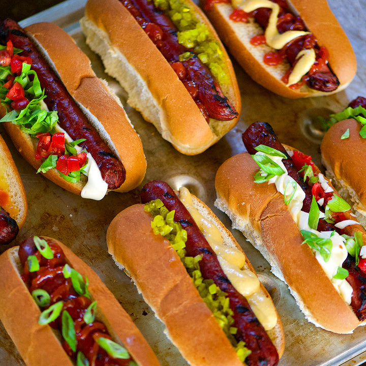 100% grass-fed and field harvested bison hot dogs grilled and placed into buns