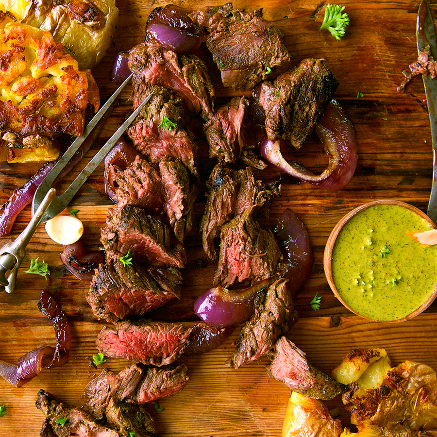 100% grass-fed and field harvested bison hanger steak with chimichurri