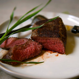 100% grass-fed and field harvested grilled bison strip steak