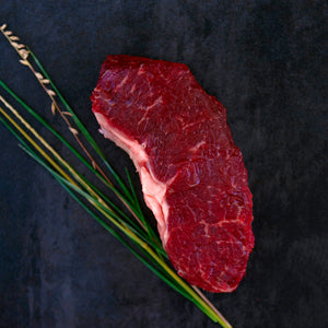 100% grass-fed and field harvested raw bison strip steak