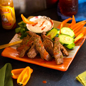 100% grass-fed and field harvested bison steak strips prepared as chislic 