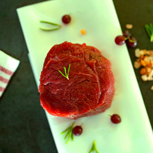 100% grass-fed and field harvested raw bison top sirloin steak