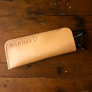 Leather eyeglasses case with brand reading "Wild Idea"