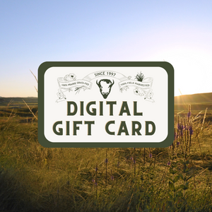 An online order for a Wild Idea Buffalo E-Gift Card nestled in the middle of a grassy field.