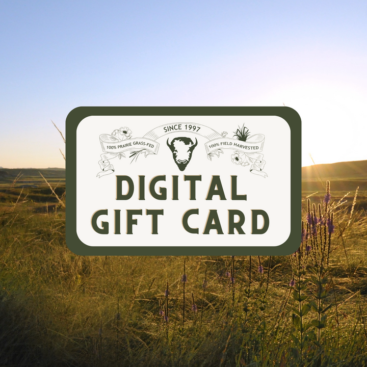 An online order for a Wild Idea Buffalo E-Gift Card nestled in the middle of a grassy field.